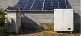 Battery units installed beside rooftop solar panels